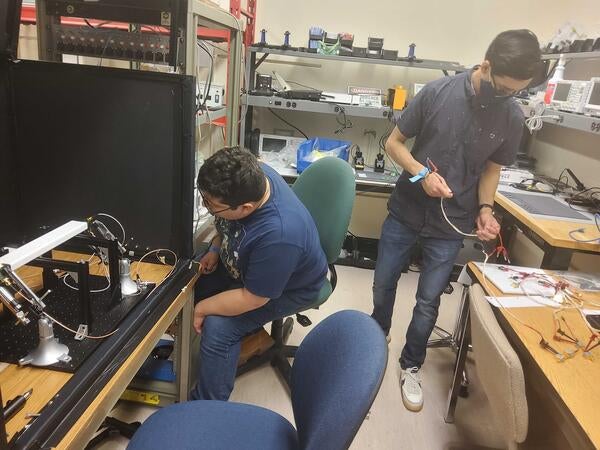 Luis Garabito and Miguel Rodriguez in the lab