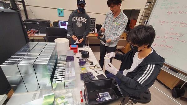 Miguel Rodriguez, Bruce Bagby and JiaJun Huang assembling a layer for insert prototype. November 2022