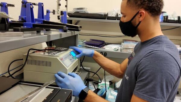 Peter Carney with reflow soldering SiPMs boards for Calorimeter Insert EIC