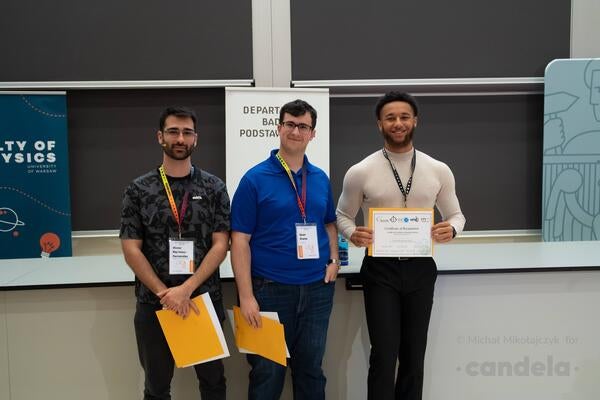 Sean Preins (middle) and Peter Carney (right) receiving best-talk prizes at the EIC user group meeting in Warsaw, Poland. 2023