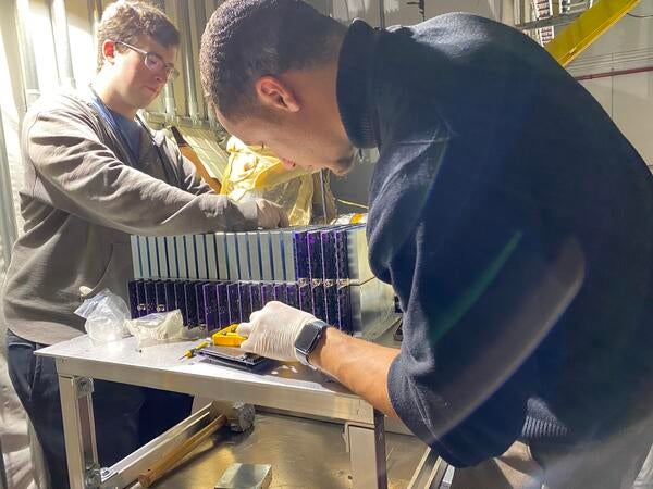 Sean Preins and Peter Carney assembling Insert detector prototype at RHIC